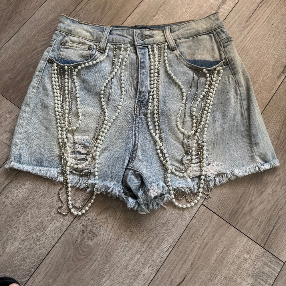 Pearl embellished denim shorts